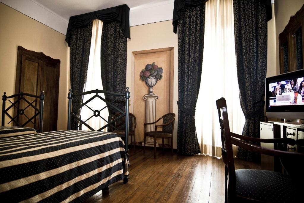 Hotel Regina Πινερόλο Δωμάτιο φωτογραφία