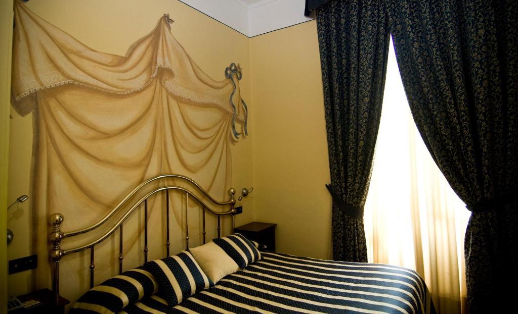 Hotel Regina Πινερόλο Δωμάτιο φωτογραφία